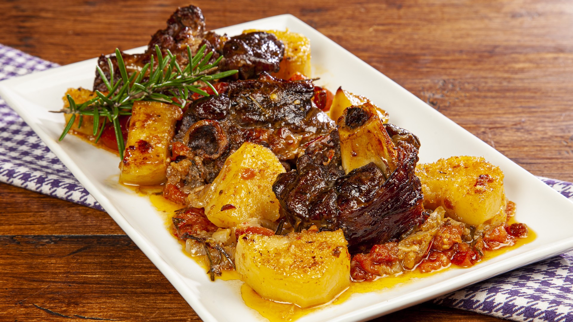 Agnello con patate al forno