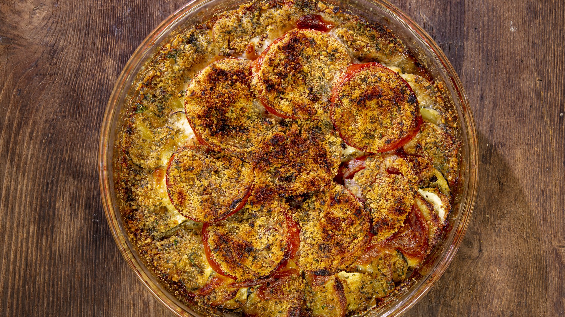 Zucchine patate e pomodori al gratin